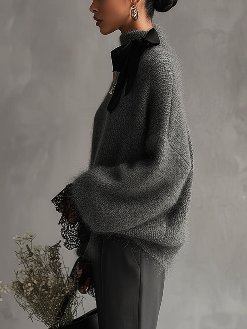 Elegancki szary sweter moherowy z delikatnymi koronkowymi mankietami